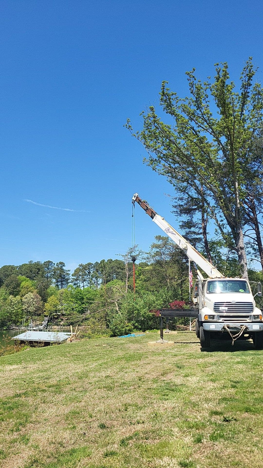 Gallery photos for Crane Tree Removal Over a Waterfront Boat House: Image #1